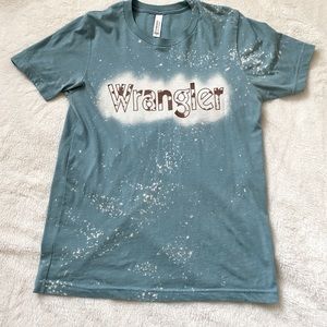 Bella canvas wrangler tee cow print and turquoise women’s xs